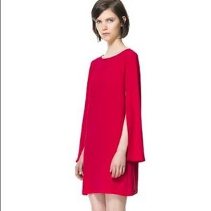 Red cape sleeve dress